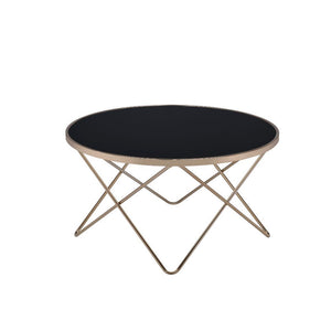 Update your living room with a functional art piece. The Valora coffee table uses a mid-century inspired base finished in champagne and supports a framed black glass top. The finish and black glass make for a sophisticated look.<br/><br/><b>Product Featur