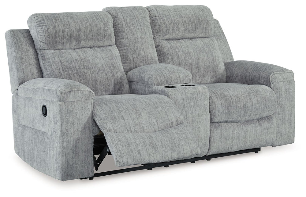 This budget-friendly reclining loveseat with console makes it so easy to stream a new series or nap for a good, long time. Sumptuous on-trend textured upholstery, plump cushioning and simple pull tab reclining make it the best seat in the house. A center 