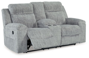 This budget-friendly reclining loveseat with console makes it so easy to stream a new series or nap for a good, long time. Sumptuous on-trend textured upholstery, plump cushioning and simple pull tab reclining make it the best seat in the house. A center 