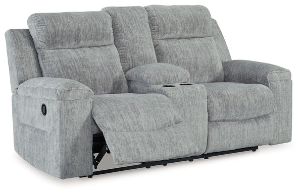 This budget-friendly reclining loveseat with console makes it so easy to stream a new series or nap for a good, long time. Sumptuous on-trend textured upholstery, plump cushioning and simple pull tab reclining make it the best seat in the house. A center 