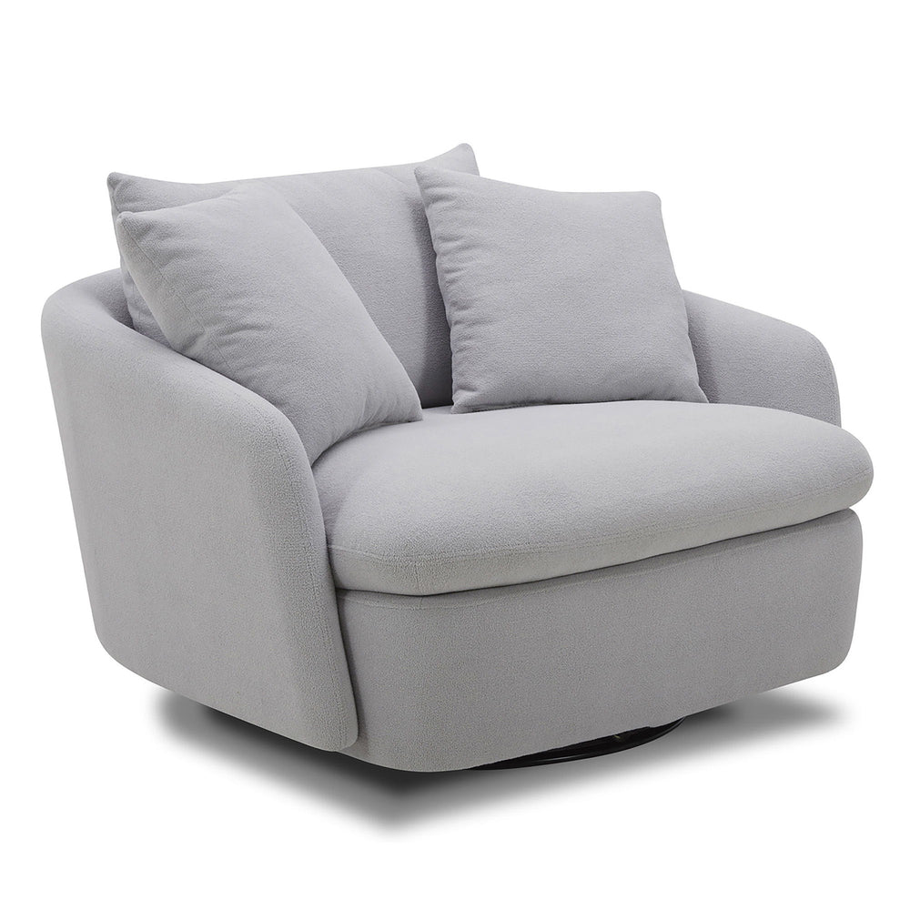 Dreamy comfort awaits with the Boomer oversized swivel chair. Comfy and cozy, its generous proportions are ideal for snuggling and nestling deep for relaxation. Its rounded silhouette has low arms and is complemented by a back pillow and two comfort pillo