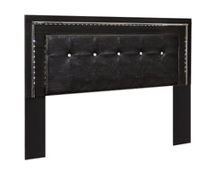 Rest easy. The luxurious look youâ€™ve been dreaming of is yours for the taking, at a price sure to put you at ease. This upholstered headboard brings a sense of old Hollywood with a contemporary flair. A deep, dark finish, faceted chrome-tone accents and