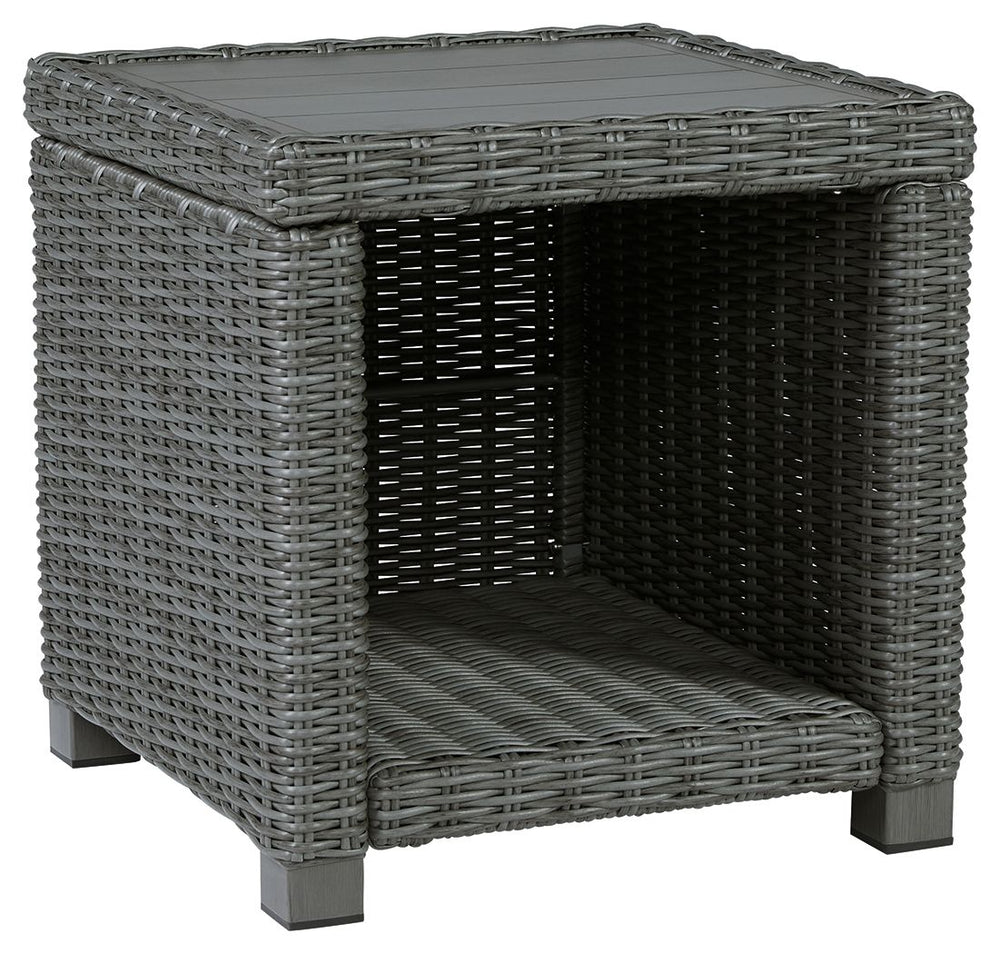 Add a distinguished touch of gray to your outdoor living space with this end table. This head-turning table is made with resin wicker over an aluminum frame for a relaxed look that provides seasons of enjoyment. Its aluminum top combines the exceptional d