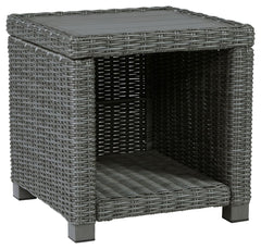 Add a distinguished touch of gray to your outdoor living space with this end table. This head-turning table is made with resin wicker over an aluminum frame for a relaxed look that provides seasons of enjoyment. Its aluminum top combines the exceptional d