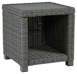 Add a distinguished touch of gray to your outdoor living space with this end table. This head-turning table is made with resin wicker over an aluminum frame for a relaxed look that provides seasons of enjoyment. Its aluminum top combines the exceptional d