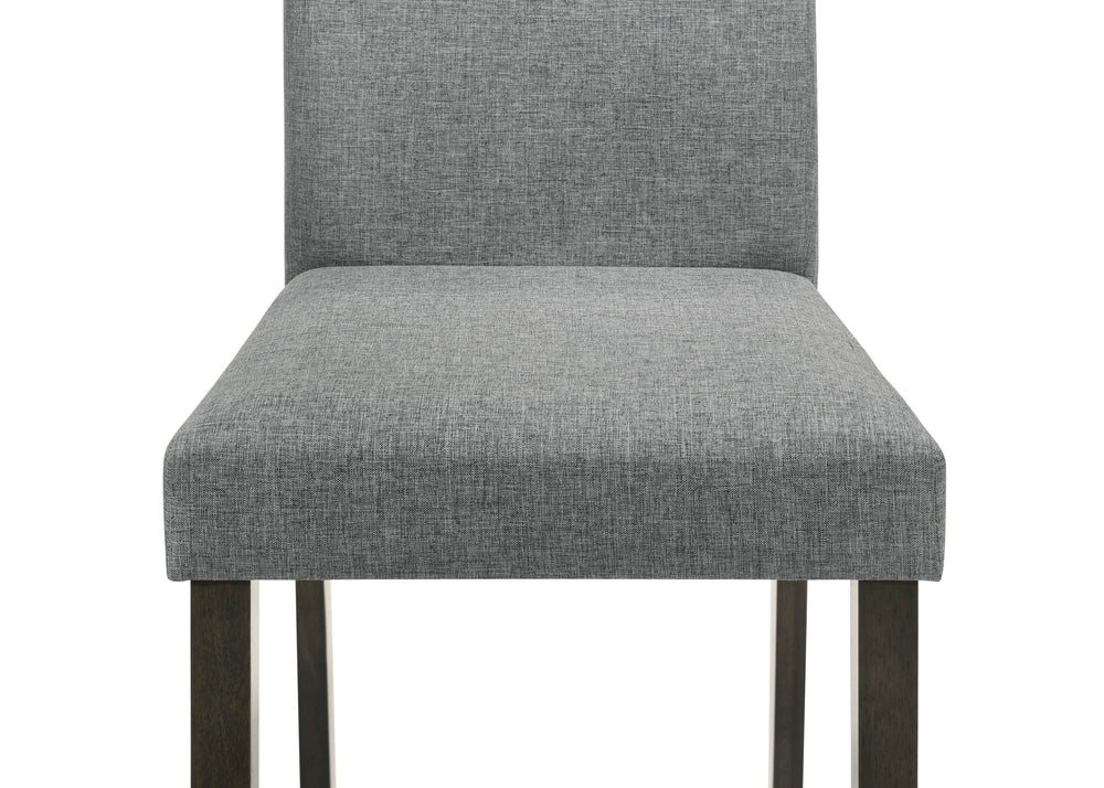 This dining group is a perfect fusion of minimalist design and everyday practicality. The sleek, rectangular table boasts a smooth, dark wood finish that adds a touch of sophistication to any dining space. Complemented by four comfortable upholstered chai