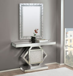 The Nowles mirrored console table demonstrates sophisticated, graceful, elegant style with its unique design. While elegantly reflecting its surroundings, this console table combines glamour with modernism. Light is captured and reflected from all angle o