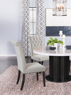  this side chair enhances any dining space. Its high backrest features a classic button-tufted design