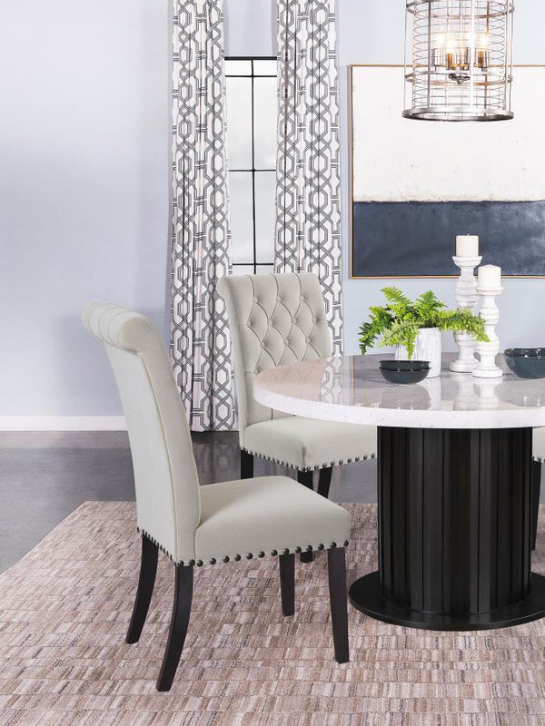  this side chair enhances any dining space. Its high backrest features a classic button-tufted design
