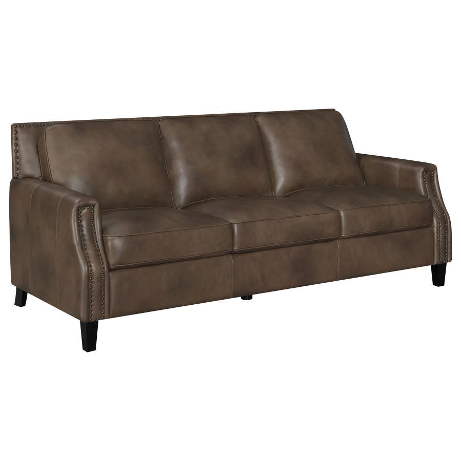 Set your sights on a sofa that brings comfort and style to your living space. Upholstered in an attractive brown sugar fabric, this piece consists of luxurious leather grain fabric. Recessed arms add a modern element to this piece that-'s ideal for loungi