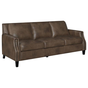 Set your sights on a sofa that brings comfort and style to your living space. Upholstered in an attractive brown sugar fabric, this piece consists of luxurious leather grain fabric. Recessed arms add a modern element to this piece that-'s ideal for loungi