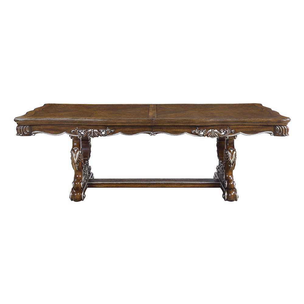 Traditional design with modern accents, the Latisha pedestal dining table is the perfect merging of contemporary and classic. The antique oak finish with the hand-brushed silver trim accentuates the elaborate floral moldings that are showcased throughout 