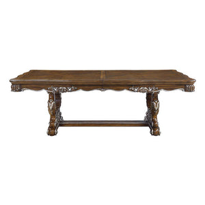  the Latisha pedestal dining table is the perfect merging of contemporary and classic. The antique oak finish with the hand-brushed silver trim accentuates the elaborate floral moldings that are showcased throughout 