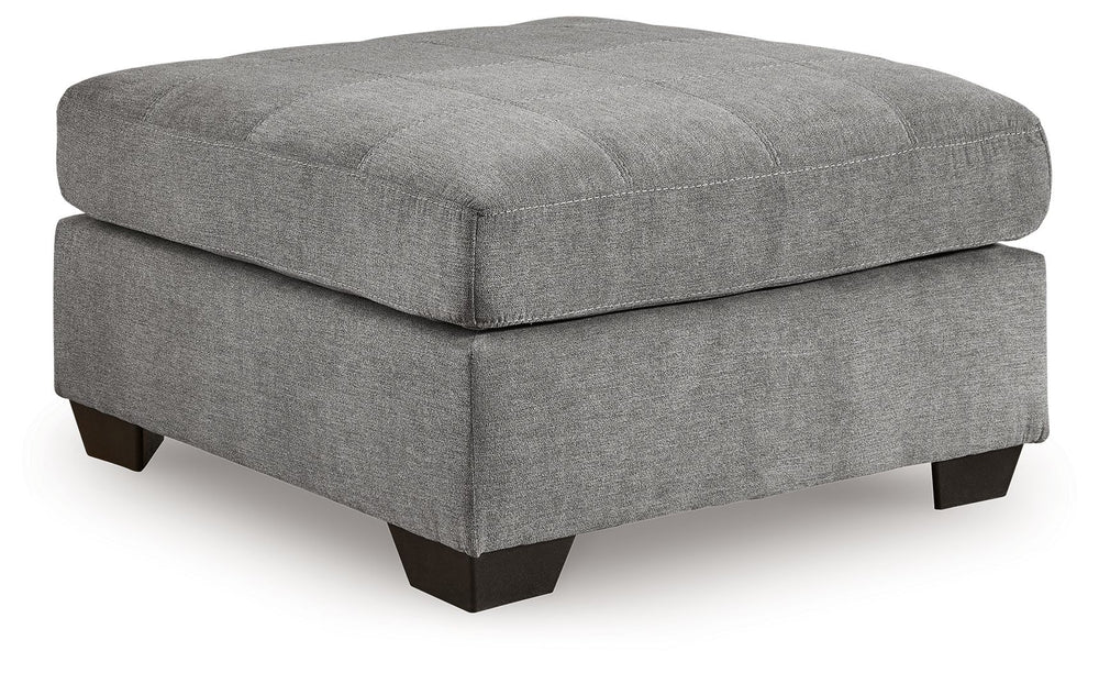 This oversized accent ottoman takes a homey approach to high style. Its gray coloration has classic versatility, while a contemporary silhouette and stitched details keep the look totally on trend. And you can count on comfortâ€”the ottoman-'s large scale