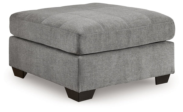 This oversized accent ottoman takes a homey approach to high style. Its gray coloration has classic versatility, while a contemporary silhouette and stitched details keep the look totally on trend. And you can count on comfortâ€”the ottoman-'s large scale