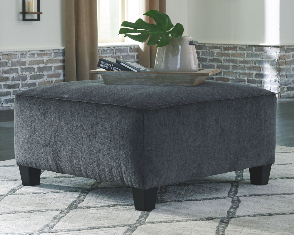 If youâ€™re looking for a smokinâ€™ hot look priced to entice, youâ€™re sure to find this oversized ottoman beautifully fits the bill. Covered in a smoke gray chenille upholstery loaded with plush texture, this less-is-more contemporary ottoman is one sen