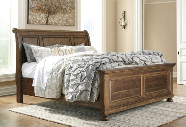  new take on traditional style. This queen sleigh bed meets todayâ€™s design tastes with beauty and grace. Tobacco brown finish allows the natural grain of the Acacia veneers to show through in an organic way. Profiled crown moulding adds depth to