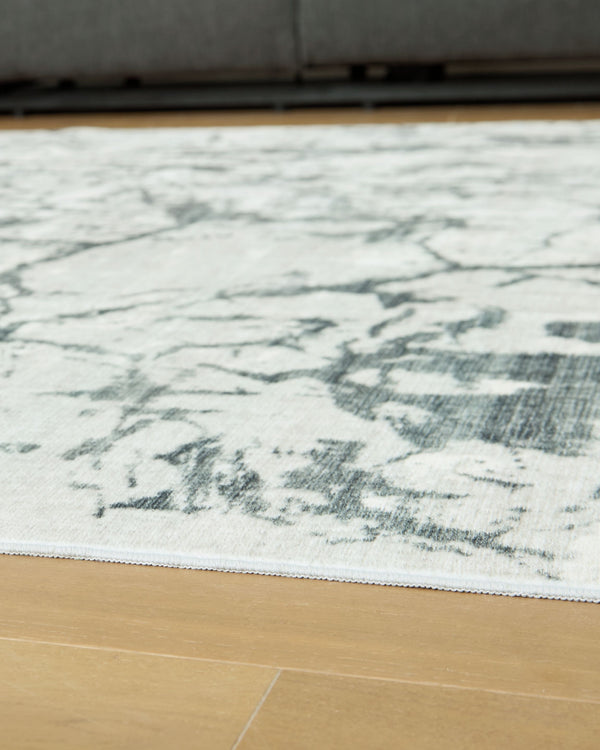  with versatile shades of gray forming an intriguing abstract design. Crafted with comfort and convenience in mind