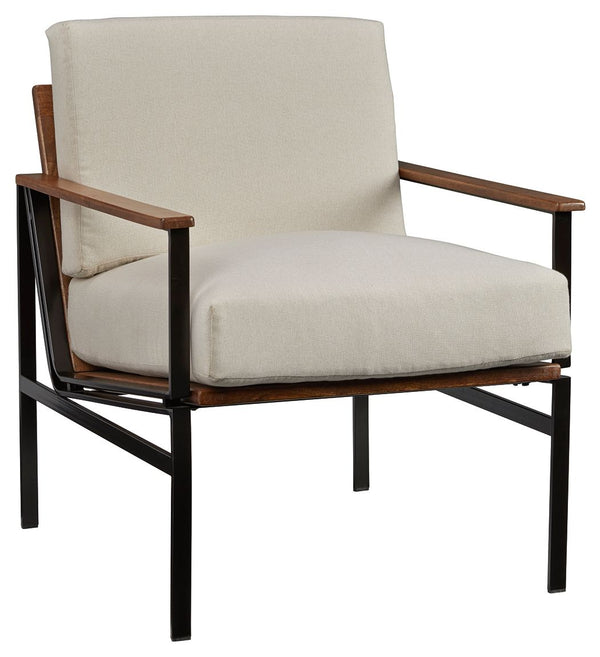 Unwind after a busy workday when you rest in this beautiful accent chair. A durable metal frame delivers intriguing industrial style with a rugged look as it ensures long-lasting stability. Plush, foam-filled cushions are wrapped in lovely fabric upholste