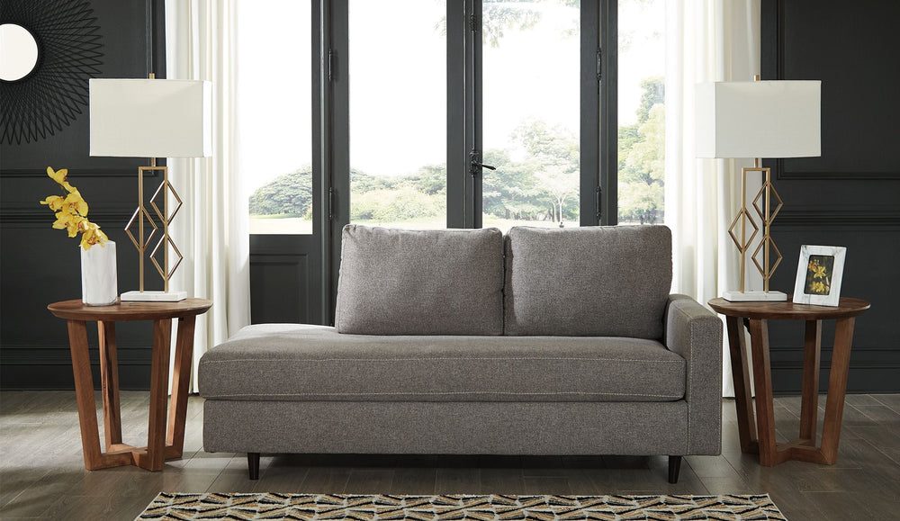 Mixing mid-century inspiration with modern attitude, this right-arm facing chaise is as retro chic as it is fashion forward. Loaded with multi-tonal interest, the granite gray upholstery is the essence of earthy elegance. Design elements include slim trac
