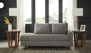  this right-arm facing chaise is as retro chic as it is fashion forward. Loaded with multi-tonal interest