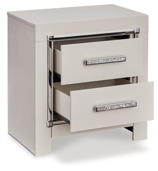  exquisitely paired with faceted chrome-tone details. Complete with wireless and USB charg