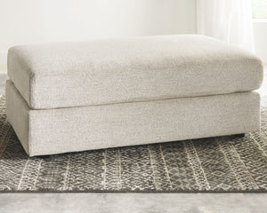  this oversized accent ottoman puts the contemporary in your contemporary home. Its ample surface space gives you elongated plushness for foot relaxation. And the chunky chenille fabric satisfies your need for a piece t