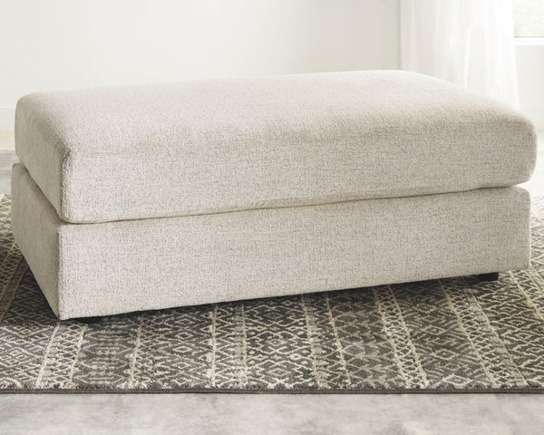  this oversized accent ottoman puts the contemporary in your contemporary home. Its ample surface space gives you elongated plushness for foot relaxation. And the chunky chenille fabric satisfies your need for a piece t