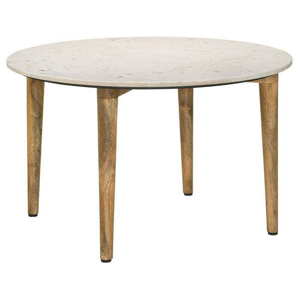 A low-key yet elegant look starts with a hand-crafted round coffee table with earthy tones and plenty of versatility. Choose this coffee table to round out a space with a natural design aesthetic and add a fluid look to a living room or family room. Made 