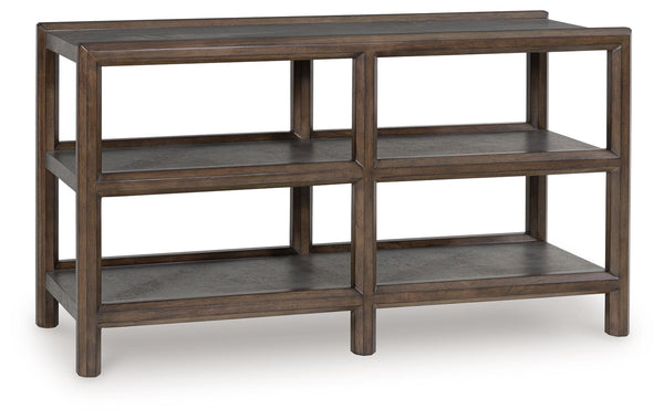 Master the art of mixed-material design with this sofa table. It sports an urban vibe, with faux cement lending an industrial edge to the contrasting dark brown finish. For a functional touch, lower shelves showcase your decor in style. Detailed mouldings