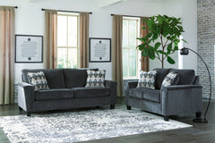Everyone can have the best seat in the house with this sofa and loveseat. An indulgent choice with deep seats crafted for cloud-like softness, this set is the ideal merger of modern flair and classic staying power. <h4><b>Abinger - Smoke - Sofa</b></h4> <