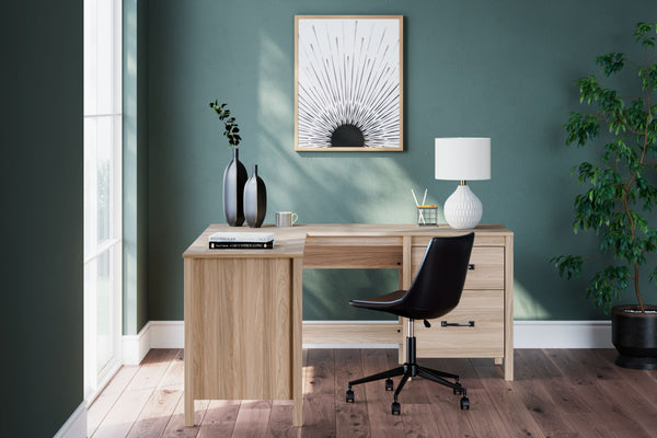  this desk and return with its two-tone finish and unique chevron pattern is sure to enhance the scheme of any home office. Spacious work surface and ample storag