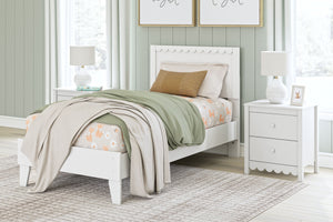  this twin platform bed is the perfect fit for cottage or coastal farmhouse interiors. Its matte white finish serves as the perfect backdrop to showcase your personal taste and creativity. Plus the low-profile bed fr