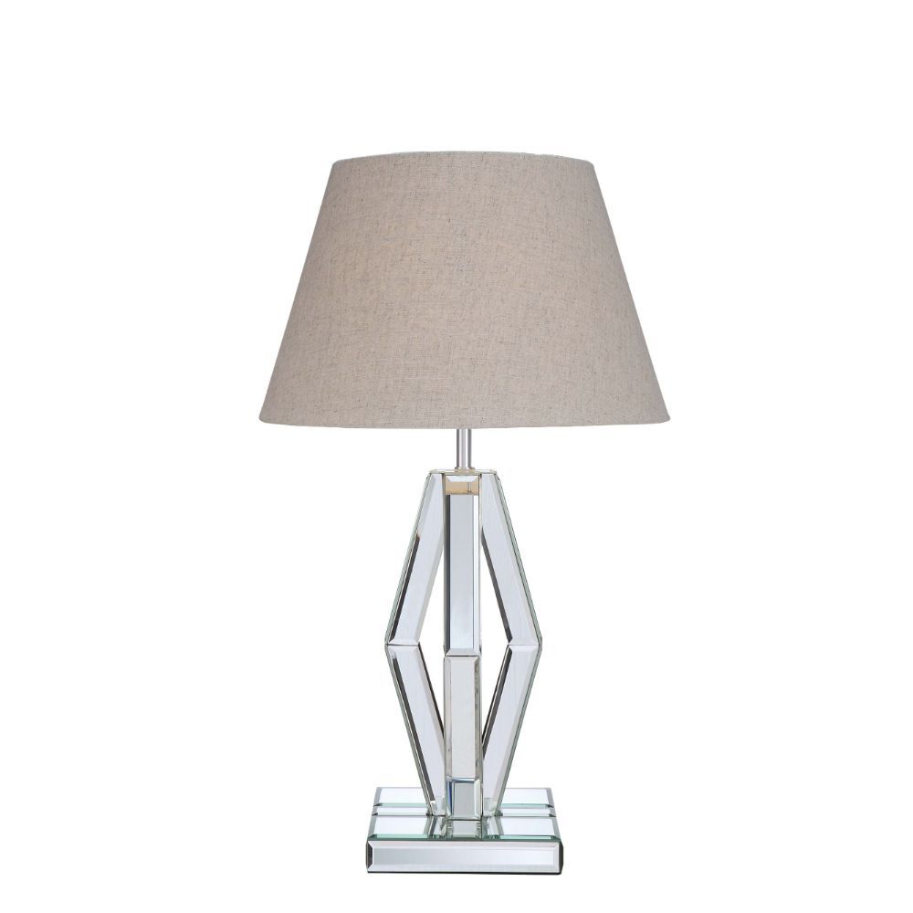 Create a luxurious space with this stunning faceted diamond crystal table lamp. This Britt table lamp is topped with a light brown fabric barrel shade and mirrored base. Featuring in LED light bulb and rocker switch on power cable, the clear finish expose