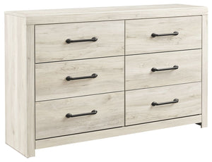 What a delightful take on rustic industrial style. Whether modern loft or modern farmhouse, this dresser makes itself at home. The wispy whitewash palette enhances without covering the grain for that weathered look you crave. Elongated drawer pulls elevat