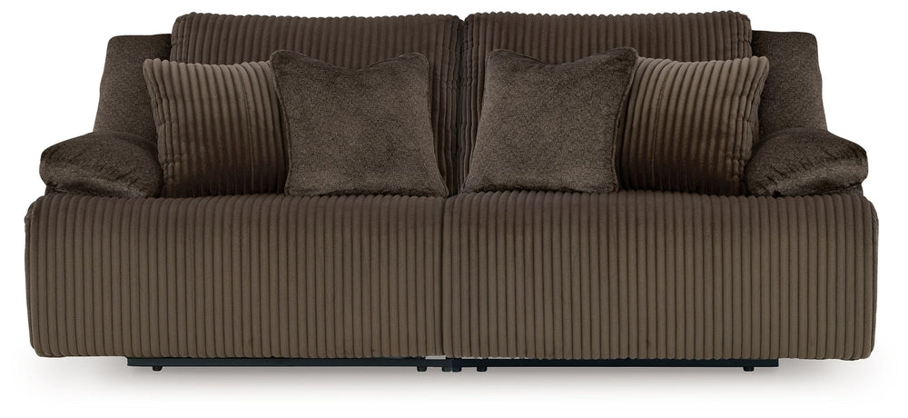 Experience unparalleled comfort with this reclining sectional loveseat. Itâ€™s a stylish and invitingly soft lookâ€”made all the more appealing by cozy corduroy cushions that feel great and add a touch of texture. The rich chocolate brown upholstery effor