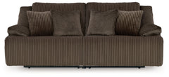 Experience unparalleled comfort with this reclining sectional loveseat. Itâ€™s a stylish and invitingly soft lookâ€”made all the more appealing by cozy corduroy cushions that feel great and add a touch of texture. The rich chocolate brown upholstery effor
