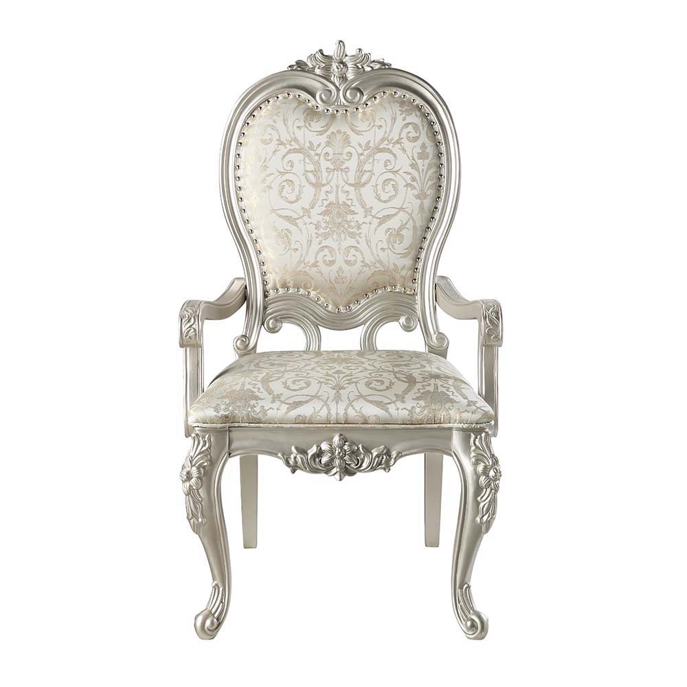 An ode to traditional glamour, the Devayne dining table brings in all the allure and charm that you are seeking for a dining table. The table features an extension leaf that allows for additional dinner guests. The champagne finish enhances the beautiful 