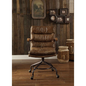  channel-seamed vintage top grain leather upholstery is complemented by a metal base with casters and metal frame armrests. It-'s Industrial design promise comfort and function a