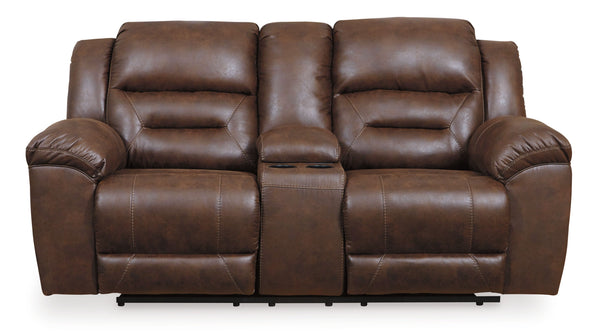 For those who love the cool look of leather but long for the warm feel of fabric, this reclining loveseat with console delivers both with ease. Its high-performance padded faux leather is remarkably durable and easy to clean, making it just the thing for 