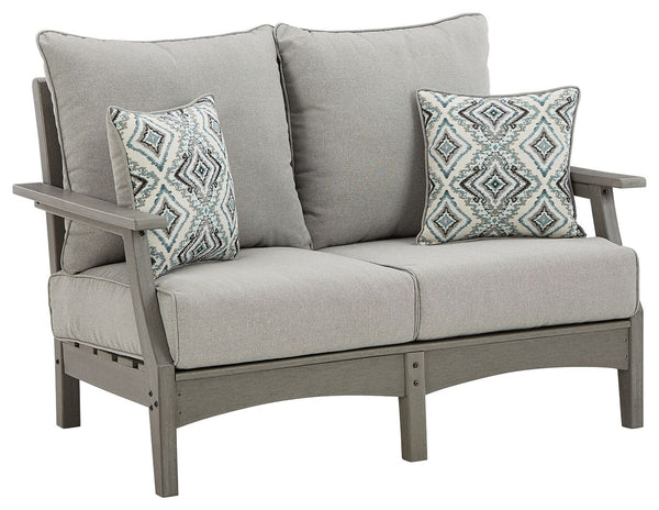 Itâ€™s the dawn of a new day for gray. Embrace the style trend with this outdoor loveseat. Crafted of HDPE material that combines the exceptional durability and weather resistance you need with the â€œwood lookâ€ you love, this comfortably cushioned love