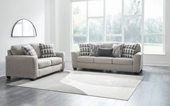 Need a simple style refresh? Liven up your space with this sofa and loveseat set. Its sleek design invites you to sink into the generous cushions. Plush, textured upholstery creates a captivating look that works for aesthetics ranging from classic to cont