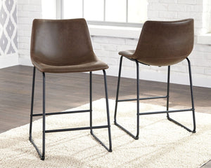  this upholstered bar stool serves up a fresh twist on mid-century inspired style. Practical faux leather has a charmingly vintage tone. What a timeless look for eat-in kitchens and casuall