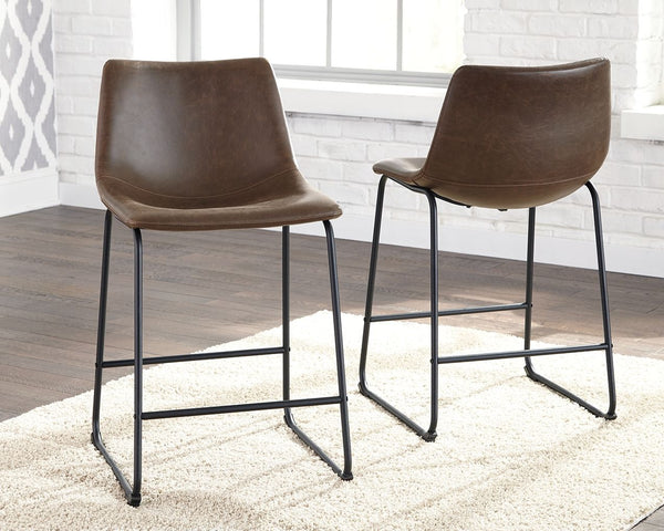  this upholstered bar stool serves up a fresh twist on mid-century inspired style. Practical faux leather has a charmingly vintage tone. What a timeless look for eat-in kitchens and casuall