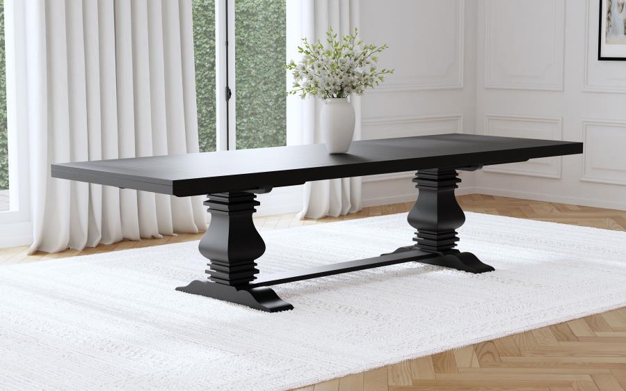 This rectangular extension dining table blends classic European elegance with artisan craftsmanship. Crafted from solid pine, it features a double pedestal trestle base that exudes romantic charm and timeless character. The sculpted pedestals, connected b