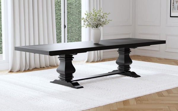  it features a double pedestal trestle base that exudes romantic charm and timeless character. The sculpted pedestals