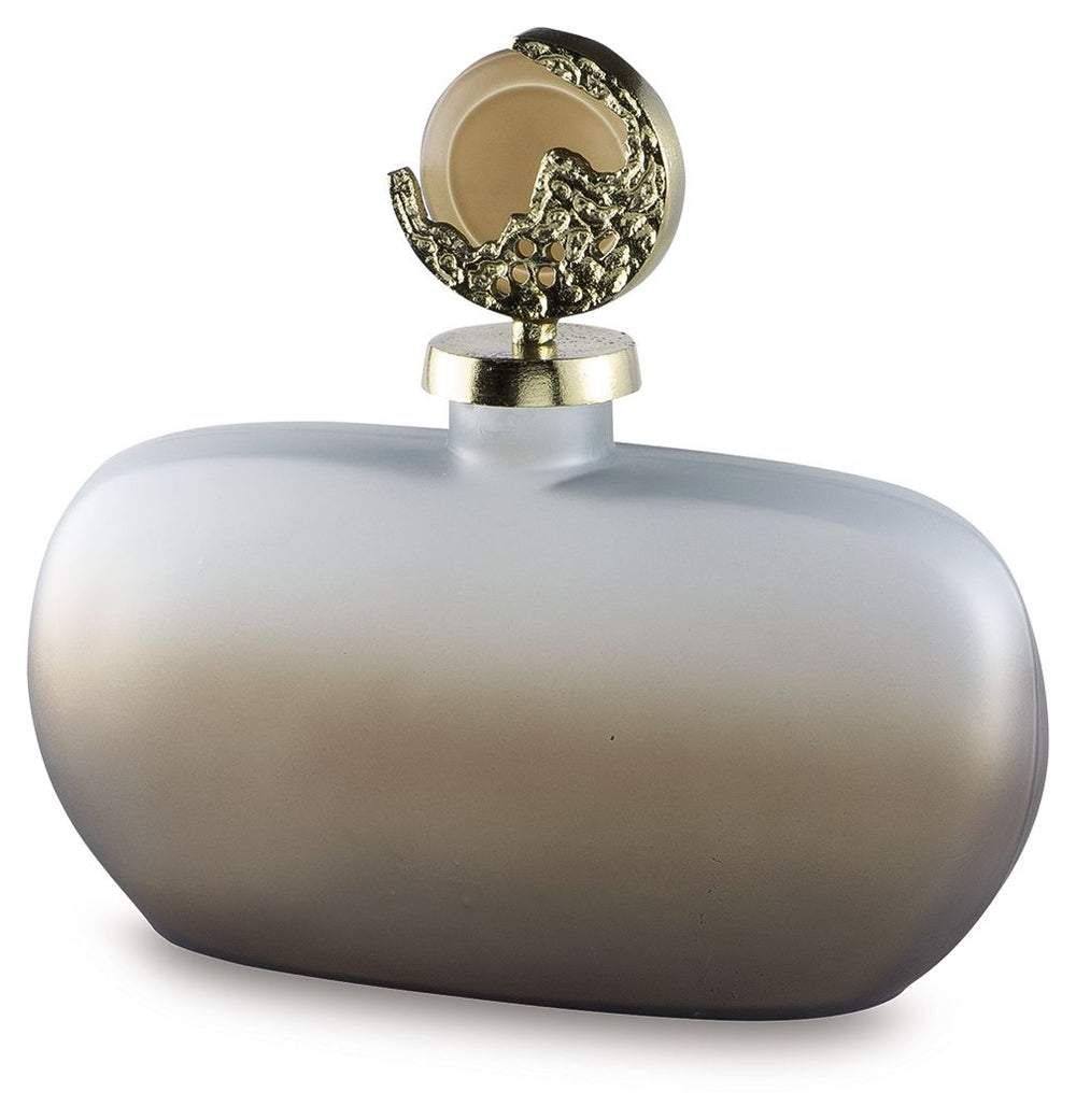 Bring stately elegance home with this jar. Made with frosted glass in a luxurious taupe finish, its ombre effect adds visual intrigue to a shelf or mantle. A textured goldtone topper provides an added dose of traditional flair.<br/><br/><b>Product Feature