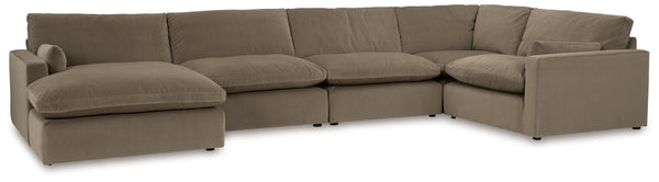 Find yourself inspired by elevated yet functional style. This sectional with chaise balances ultra-soft seating with a clean-cut appearance. Its modular design caters to your needs, whether youâ€™re making space for guests or setting up a cozy family movi