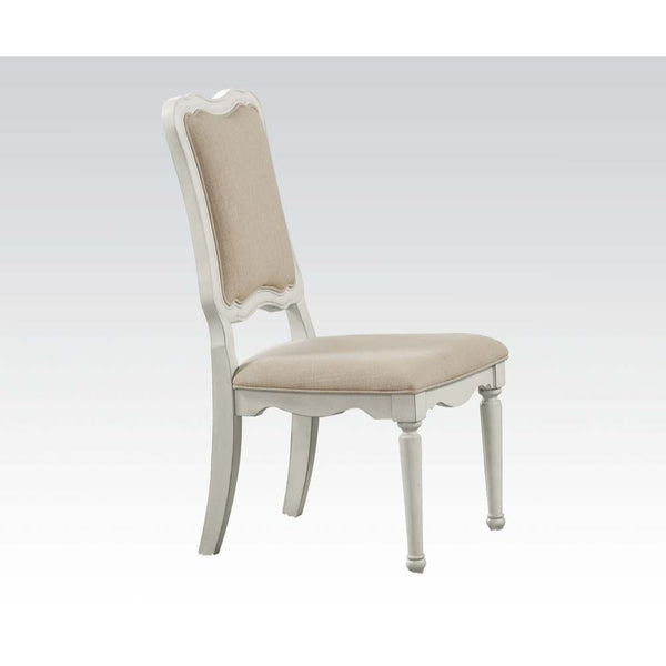 The Morre chair offers an elegant and romantic design for your bedroom. This antique white chair features an upholstered padded back and seat with welt trim, arched wooded backrest and apron seat, and wooden turned legs. Add this sleek chair to complete y