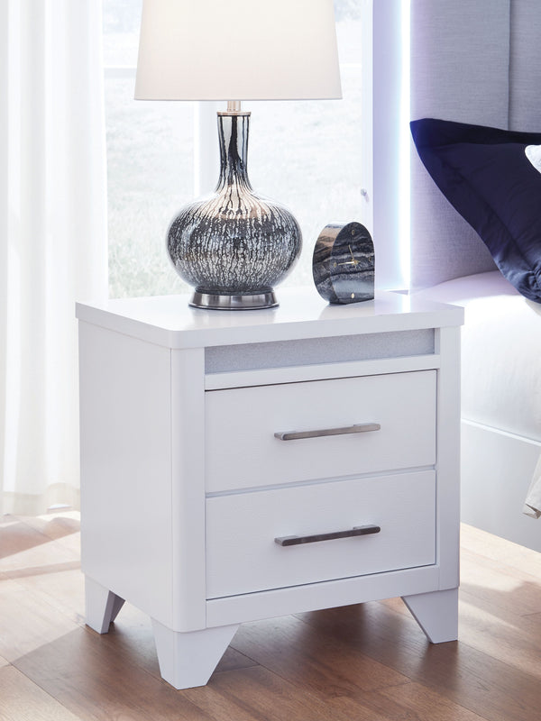  bringing a touch of modern glamour to your sanctuary. A sleek white finish and inset glitter accents create a sophisticated feel